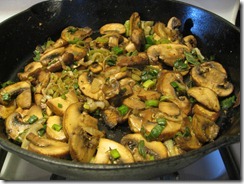 Garlic butter mushrooms with garlic scapes, onion (1)